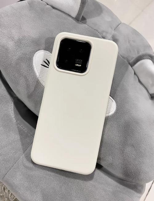 红米手机后盖怎么打开?